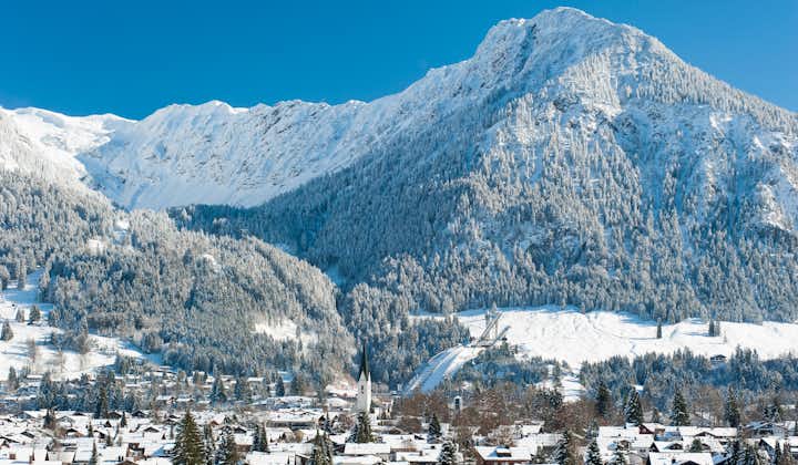photo of Oberstorf in Winter with snow in Bavaria, Germany.