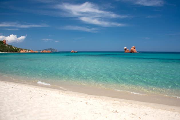 Cea beach with the Red Rocks, the Red Rocks - Faraglioni. White sand and crystal clear water. Tortoli, Ogliastra, Sardinia, Italy