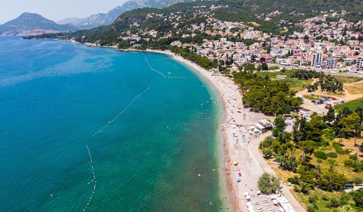 Photo of aerial view of city Bar with blue beach , Montenegro and Adriatic Mediterranean sea.