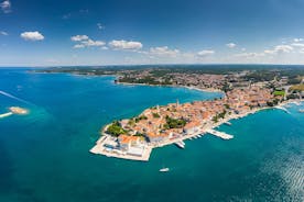 Photo of aerial view of town of Rovinj historic peninsula , famous tourist destination in Istria region of Croatia.