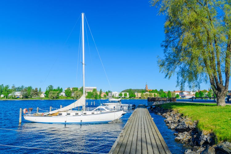  Photo of view of lake, pier and boats in Savonlinna, Finland.