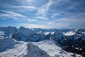 photo of the romantic, Snow covered Skiing Resort of Cortina d Ampezzo in the Italian Dolomites seen from Tofana with Col Druscie in the foreground.