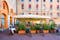 Piazza del Municipio with tables of restaurant in Ferrara, Emilia-Romagna, Italy. Ferrara is capital of the Province of Ferrara.