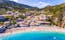 Photo of aerial view of the beautiful beach of Agios Nikitas in Lefkada island, Greece.