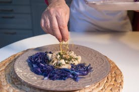 Cesarine: aula de culinária caseira e refeição com um local em Aosta