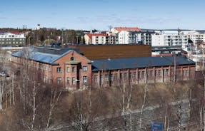 Rovaniemi Finland, panorama of the city with Kemijoki river in the back and Ounasvaara fell with the city heart at the left.