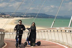 Passeio ecológico panorâmico autoguiado de Pescara de e-scooter ou bicicleta