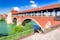 photo of Pavia, Italy. Ponte Coperto (covered bridge) or the Ponte Vecchio a stone arch bridge over the Ticino River.