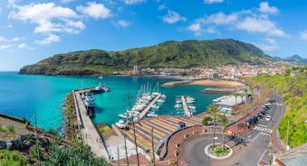 Photo of beach aerial view of Machico bay and Cristiano Ronaldo International airport in Madeira, Portugal.
