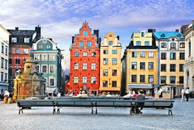 Scenic summer view of Nyhavn pier with color buildings, ships, yachts and other boats in the Old Town of Copenhagen, Denmark