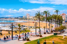 Photo of Sand beach and historical Old Town in mediterranean resort Sitges near Barcelona, Costa Dorada, Catalonia, Spain.