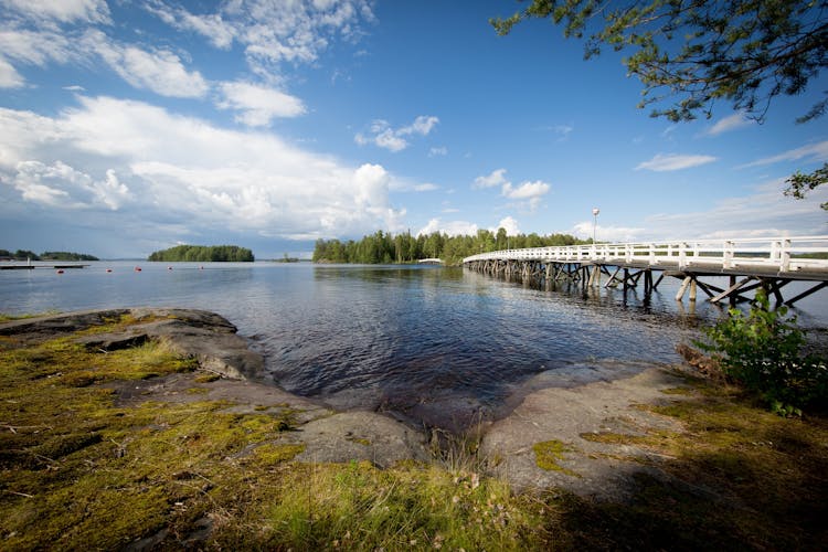 Photo of Long wooden bridge to Sulosaari in Savonlinna Finland .