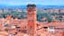 photo of Lucca, Italy - medieval town of Tuscany. Aerial view with Guinigi Tower.