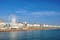 Photo of panoramic view along Brighton Beachfront with the promenade and Ferris Wheel backed by highrise buildings, UK.