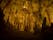 Illuminated lit lights stalagmites stalactites limestone show cave cavern Grutas da Moeda in Batalha Leiria Portugal