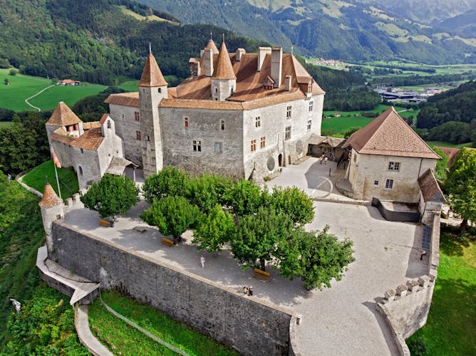 photo of view of Aerial view of the medieval Gruyere castle, Canton of Fribourg, Switzerland.