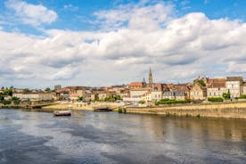 photo of the Bergerac town from bridge over Dordogne River in France.