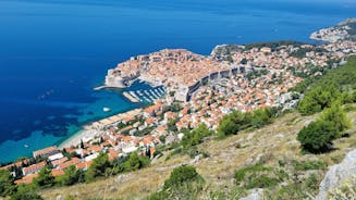 Photo of panoramic aerial view of the old town of Dubrovnik, Croatia seen from Bosanka viewpoint on the shores of the Adriatic Sea in the Mediterranean Sea.