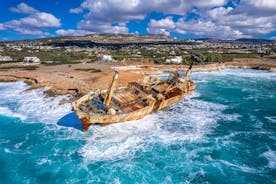 Photo of aerial view on clear blue water of Coral bay in Peyia, Cyprus.