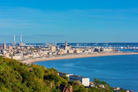 photo of Port of Deauville and city skyline in a sunny summer day, Normandy, France.