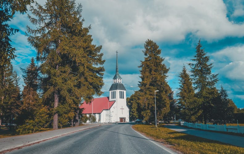 Photo of the church of Kuusamo in northern Finland on a summer day.