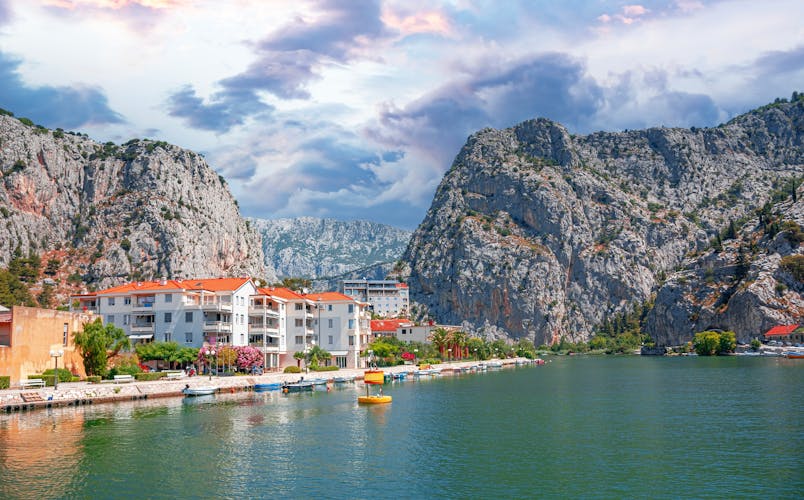 Photo of town in Dalmatia where Cetina River meets the Adriatic Sea ,Omis ,Croatia.