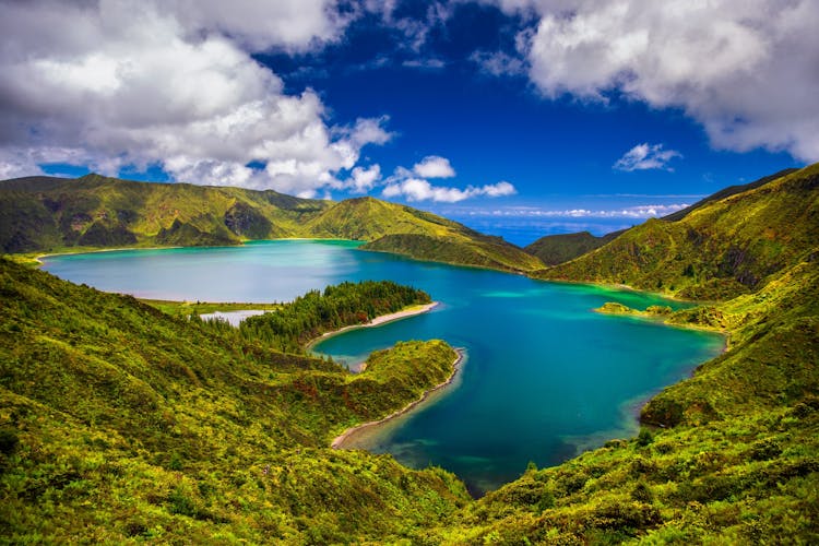 Photo of beautiful panoramic view of Lagoa do Fogo lake in Sao Miguel Island, Azores, Portugal. 
