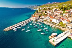 photo of aerial panoramic view of beautiful town of Lovran and sea walkway in Croatia.