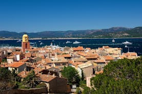 Photo of beautiful aerial view of Saint-Tropez, France with seascape and blue sky.