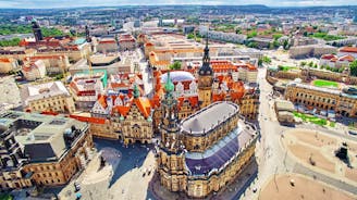 Photo of scenic summer view of the Old Town architecture with Elbe river embankment in Dresden, Saxony, Germany.