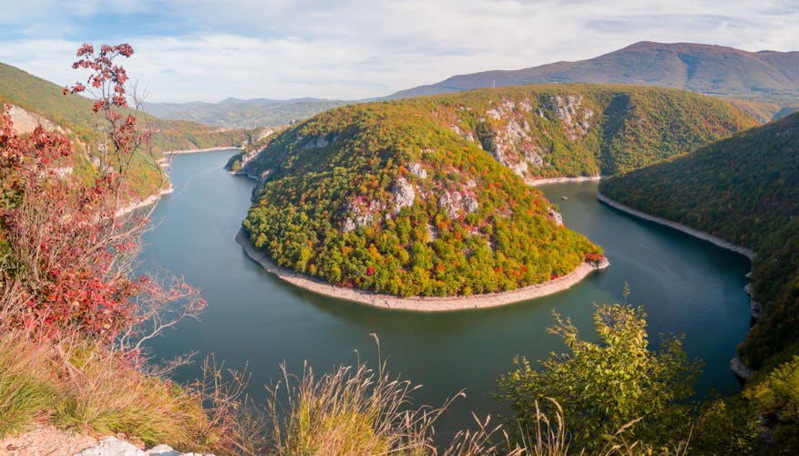 PHOTO OF VIEW OF An accumulation lake on the Vrbas River west of Banja Luka, in a canyon between the Manjača and Čemernica mountains. Beautiful view of nature with autumn colors. - Image