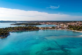 Photo of aerial view of beautiful town of Medulin waterfront view, Istria region of Croatia.