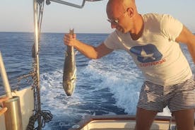 Gita in barca da pesca con pescatore professionista (piccolo gruppo)