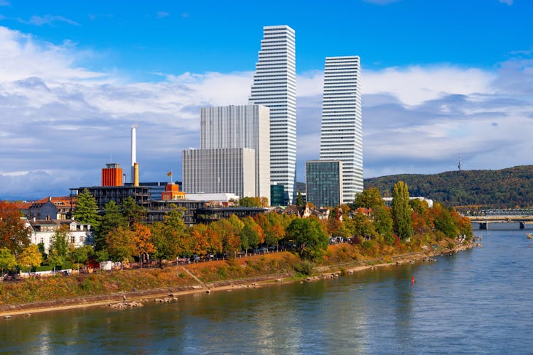 Photo of  office buildings cityscape on the Rhine River in autumn.Basel, Switzerland