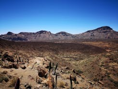 Photo of aerial view with Puerto de la Cruz, in background Teide volcano, Tenerife island, Spain.