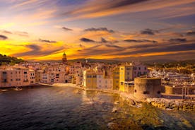 Photo of beautiful aerial view of Saint-Tropez, France with seascape and blue sky.