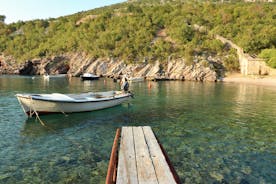 photo of  Pláž Senj it's a small beach hidden by vegetation near the Adriatic Sea, Senj, Croatia.