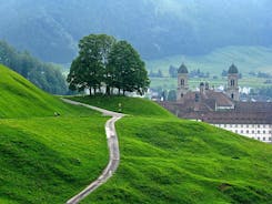 photo of the villages Schwyz and Rickenbach with the mountains Grosser Mythen and Kleiner Mythen in the background in Switzerland.