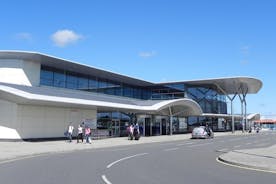 Privétransfer bij aankomst in Guernsey - luchthaven naar hotel / accommodatie