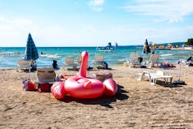 Photo of panorama and landscape of Makarska resort and its harbour with boats and blue sea water, Croatia.