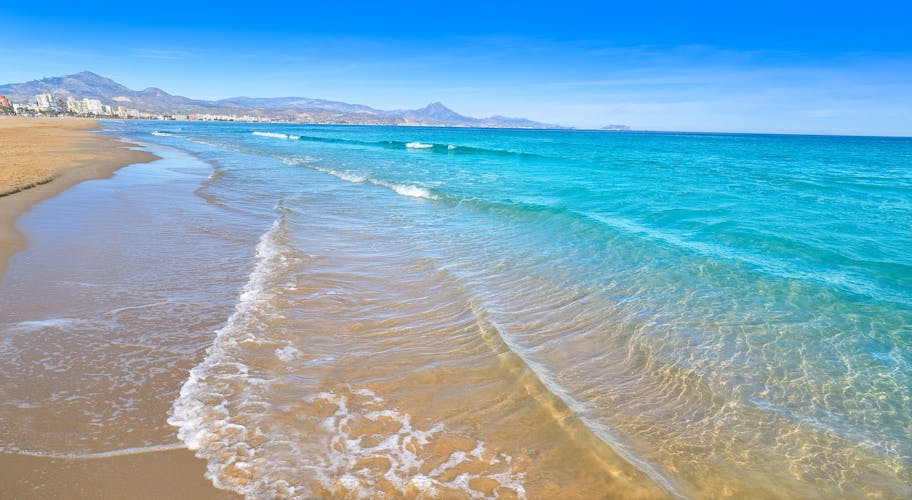 Photo of San Juan of Alicante beautiful beach with clear water playa at Costa blanca of Spain.