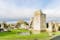 Photo of beautiful landscape view of flooded ruins Kells Priory in Ireland.