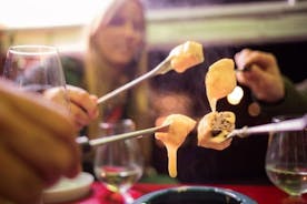 Fondue og vin privat Tuk Tuk-tur i Genève