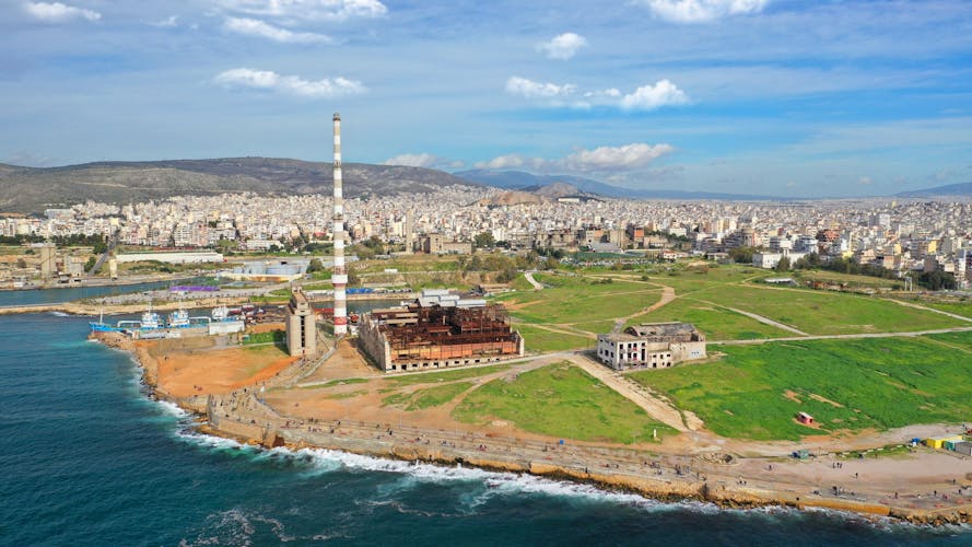 Photo of Aerial drone view from abandoned public fertiliser factory as seen at sunny winter slightly cloudy morning, Piraeus main port, Attica, Greece.