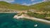 photo of view ofAerial drone photo of beautiful sandy bay and picturesque small chapel of Agios Fokas in island of Skiros, Sporades, Greece,Parikia greece.