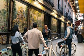 Bohemian 19th to 20th Century Guided Night Bike Tour in Madrid