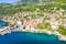 photo of aerial panoramic view of beautiful town of Lovran and sea walkway in Croatia.