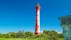 Photo of red Pakri Lighthouse found in the town of Paldiski in Estonia one of the tourist spots in the city.