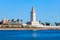 Photo of Lighthouse in the port of Malaga. Malaga is a city in the Andalusia community in Spain.