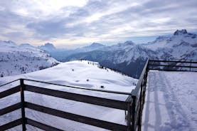 photo of the romantic, Snow covered Skiing Resort of Cortina d Ampezzo in the Italian Dolomites seen from Tofana with Col Druscie in the foreground.